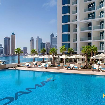 Sleek Studio In Prive With Stunning Canal View Dubai Bagian luar foto